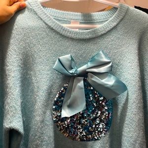 Wore once  baby blue sweater Size M